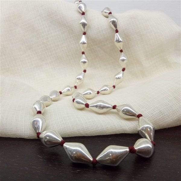 Niboli Beads With Red Thread Mala